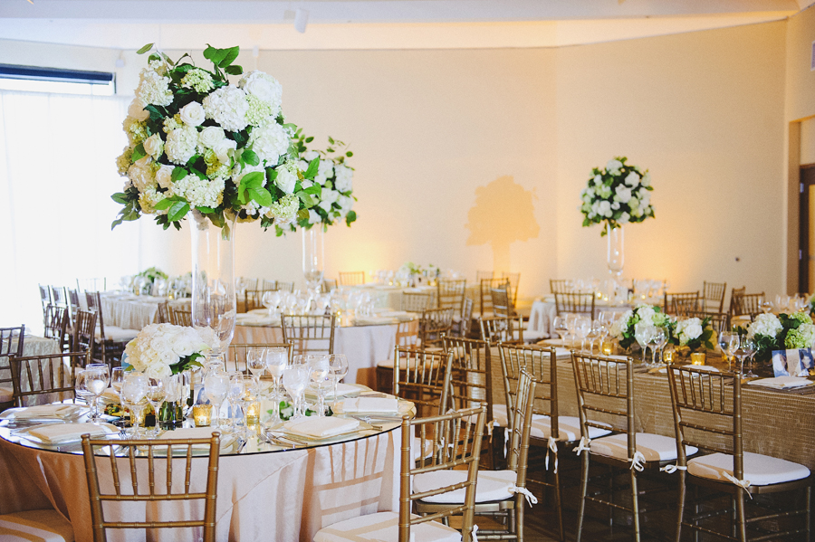 White and green focal arrangements for wedding ceremony by Yellow Canary Floral & Event Design