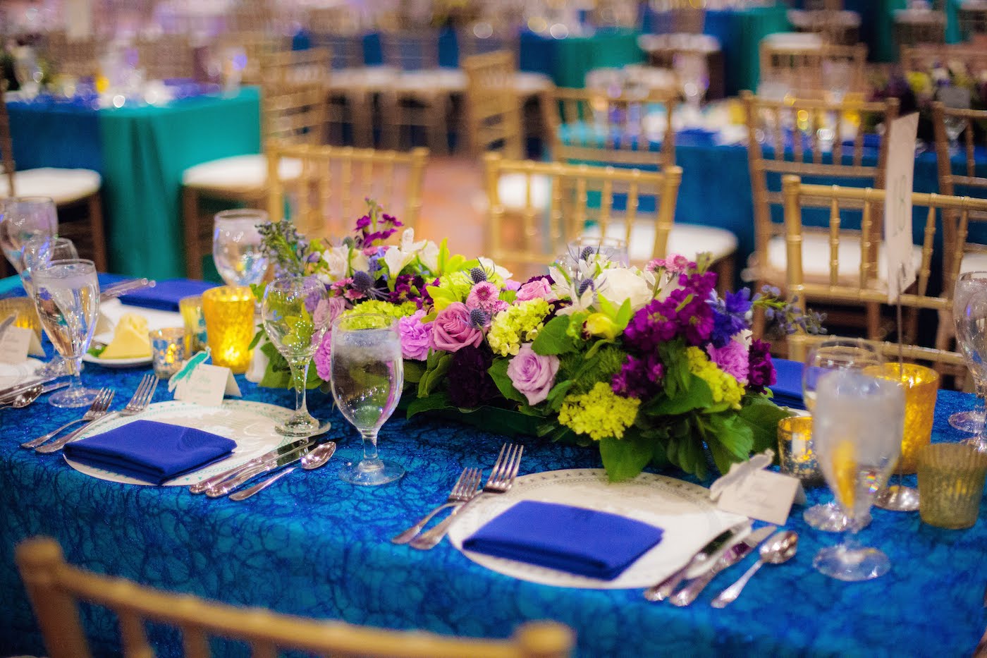 Rectangle short floral arrangement by Yellow Canary Floral & Event Design with rose, hydrangea and dusty miller for Health Carousel Gala