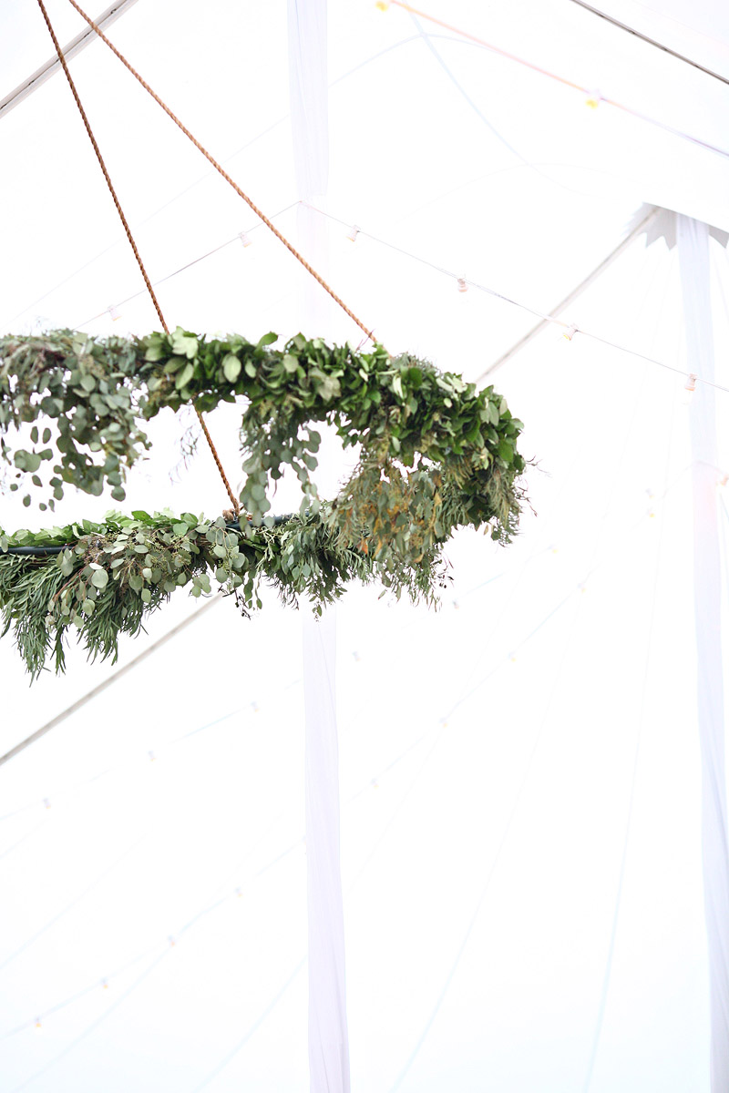 Suspended floral chandelier for Tuscan inspired wedding ceremony and reception at family farm. Florals by Yellow Canary Floral + Event Design. www.yellowcanaryonline.com 