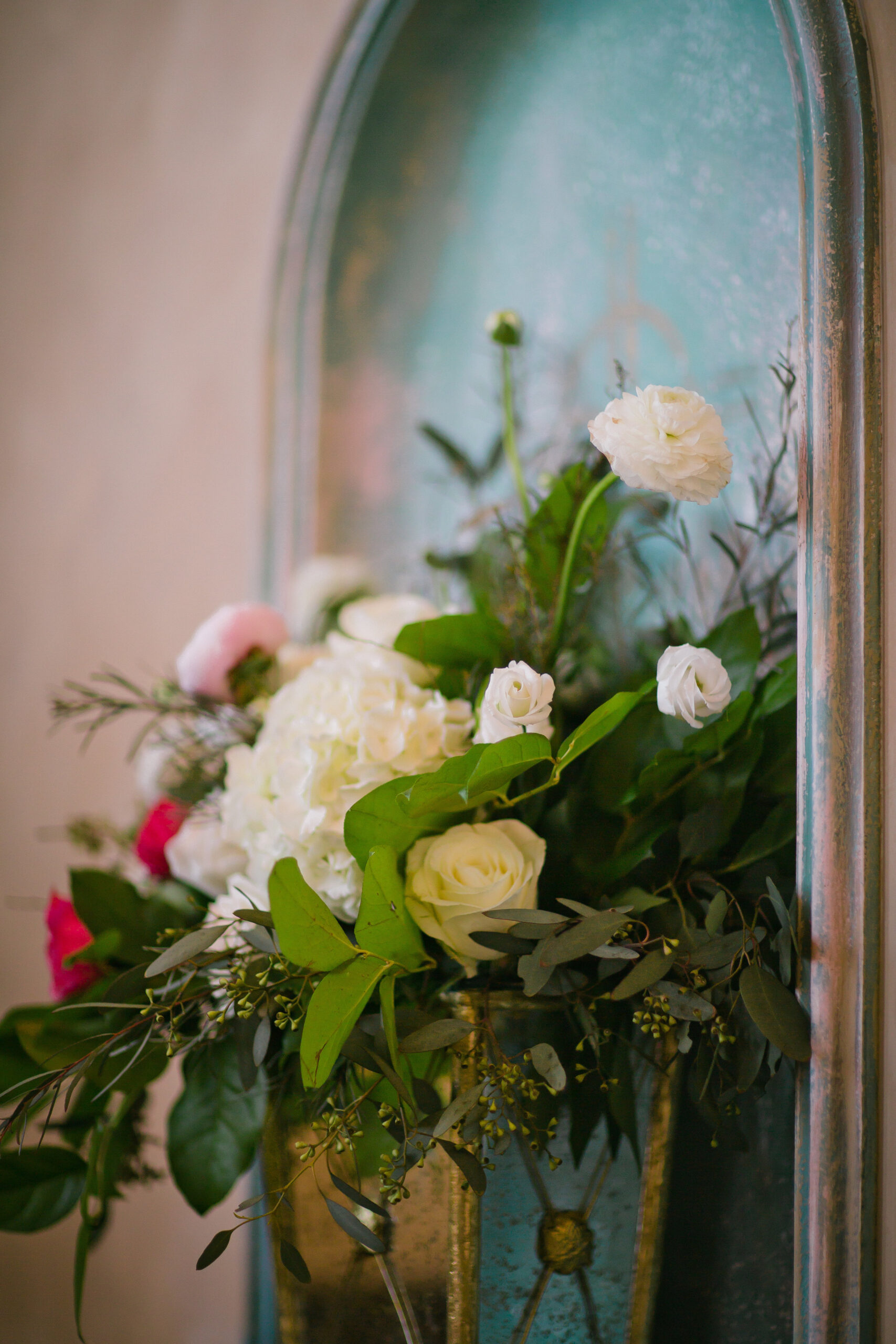 Focal arrangement with pink, white, and red roses for Monastery Event Center wedding in Cincinnati.  Florals by Yellow Canary www.yellowcanaryonline.com