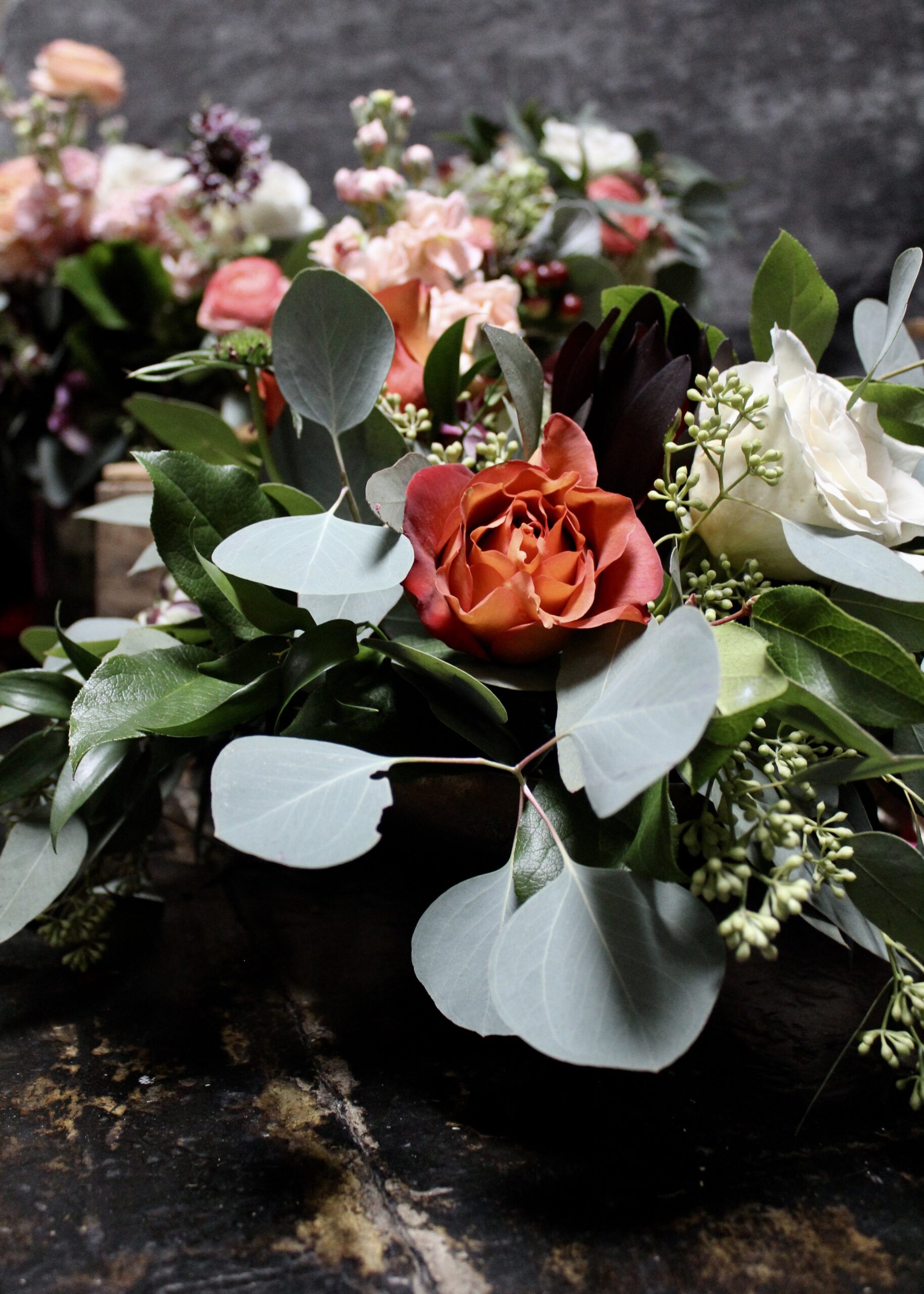 Arrangement with peach, blush, and white for spring wedding in Cincinnati.