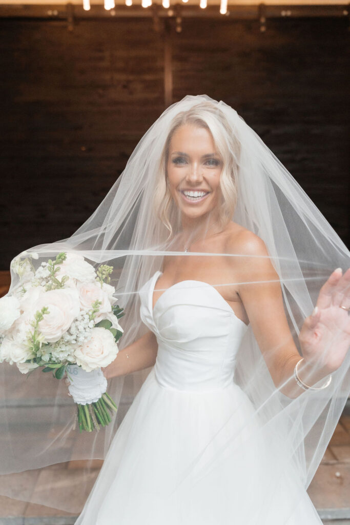 bride with veil and bouquet